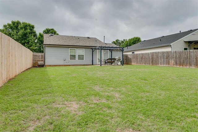 1705 NW 147th St, Edmond, OK 73013 - back of property with a pergola