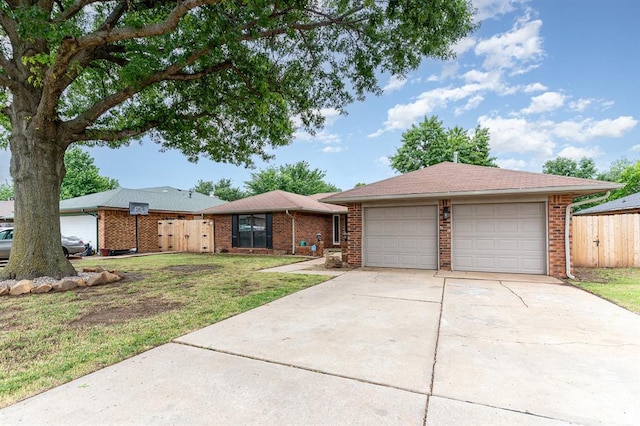 2232 Butternut Pl, Edmond, OK 73013 - single story home with brick siding and a detached garage