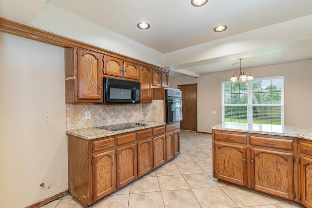 2232 Butternut Pl, Edmond, OK 73013 - kitchen featuring black appliances, brown cabinetry, tasteful backsplash, a chandelier, and decorative light fixtures