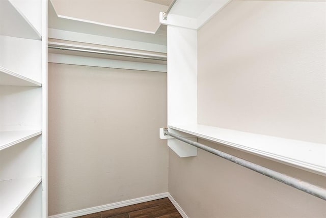 2232 Butternut Pl, Edmond, OK 73013 - spacious closet with dark wood finished floors