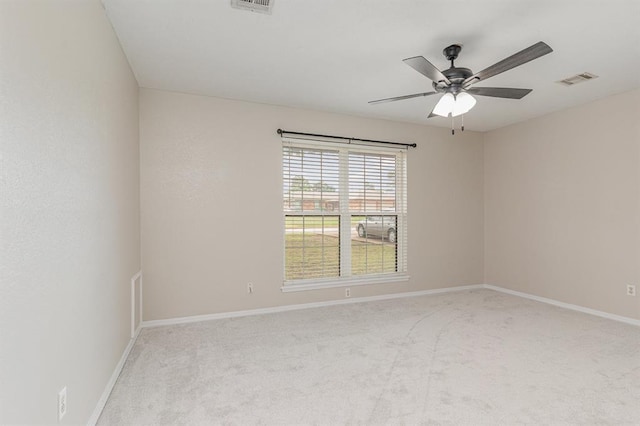 2232 Butternut Pl, Edmond, OK 73013 - unfurnished room featuring carpet flooring, a ceiling fan, and baseboards