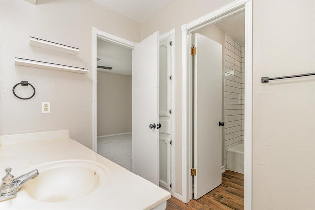 2232 Butternut Pl, Edmond, OK 73013 - full bath featuring vanity and wood finished floors