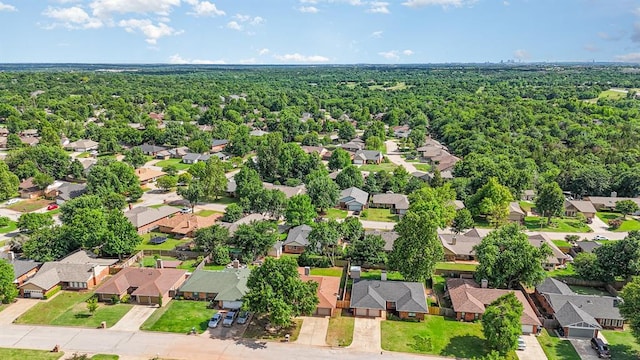2232 Butternut Pl, Edmond, OK 73013 - aerial view of residential area with a heavily wooded area