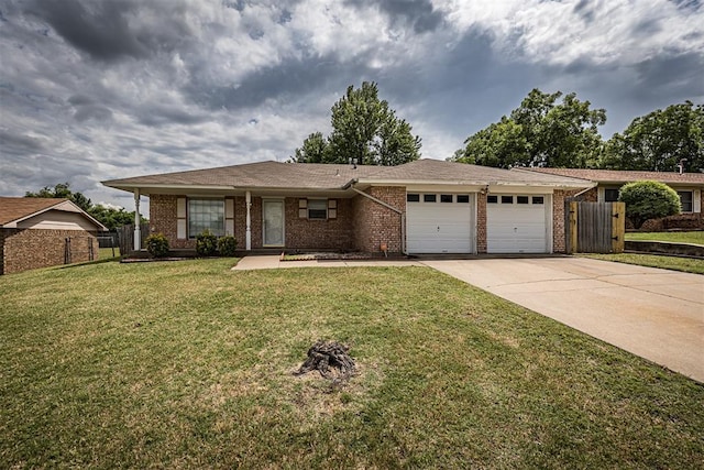 7506 NW Welco Ave, Lawton, OK 73505 - ranch-style house with a garage, driveway, and brick siding