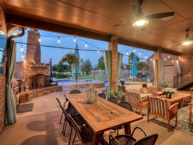 15321 Salem Creek Pl, Edmond, OK 73013 - fenced backyard featuring a patio area, outdoor dining space, and a ceiling fan