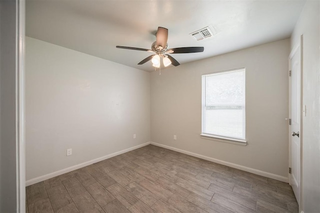 6100 SE 7th St, Midwest City, OK 73110 - unfurnished room with ceiling fan, wood finished floors, and baseboards
