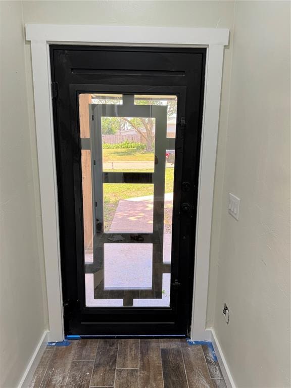 106 Briarwood Crossroads, Moore, OK 73160 - doorway to outside with wood finished floors and baseboards