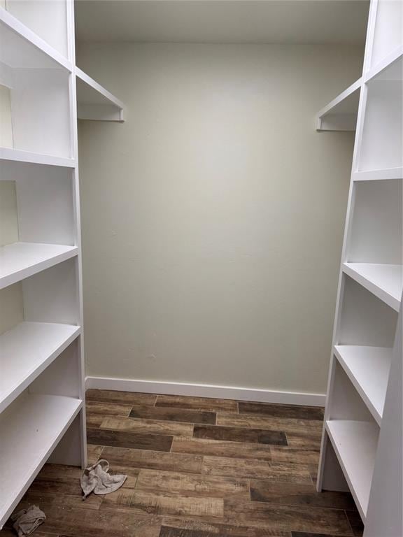 106 Briarwood Crossroads, Moore, OK 73160 - spacious closet featuring dark wood finished floors