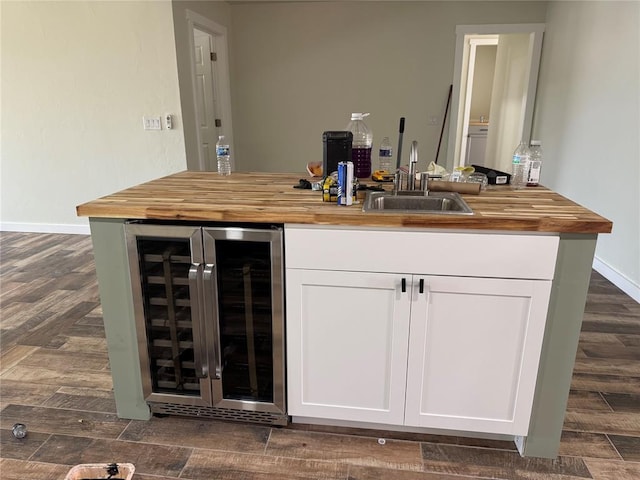 106 Briarwood Crossroads, Moore, OK 73160 - indoor bar featuring wine cooler, dark wood finished floors, and baseboards