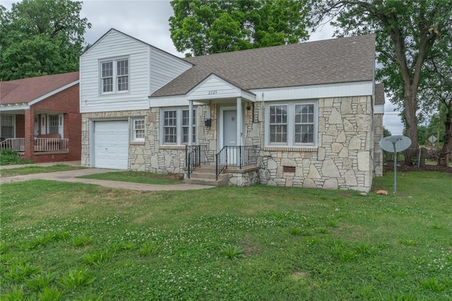 2325 E Madison St, Oklahoma City, OK 73111 - view of front of home featuring stone siding, a front yard, a garage, and roof with shingles