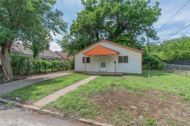 2325 E Madison St, Oklahoma City, OK 73111 - bungalow featuring a porch