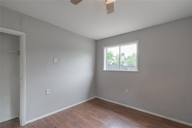 2325 E Madison St, Oklahoma City, OK 73111 - unfurnished bedroom featuring wood finished floors and ceiling fan