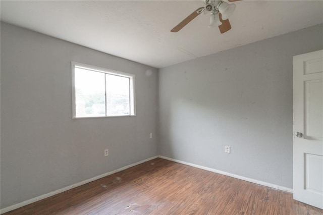 2325 E Madison St, Oklahoma City, OK 73111 - unfurnished room featuring a ceiling fan and wood finished floors