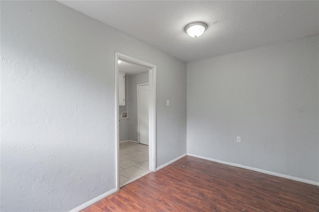 2325 E Madison St, Oklahoma City, OK 73111 - unfurnished room with wood finished floors and baseboards
