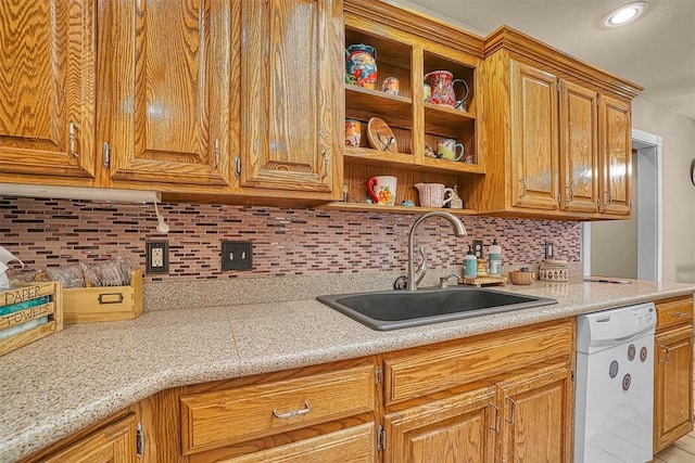 409 Pheasant Cir, Altus, OK 73521 - kitchen with dishwasher, light countertops, backsplash, open shelves, and brown cabinetry