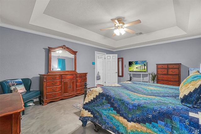 409 Pheasant Cir, Altus, OK 73521 - carpeted bedroom with a tray ceiling, a ceiling fan, and ornamental molding
