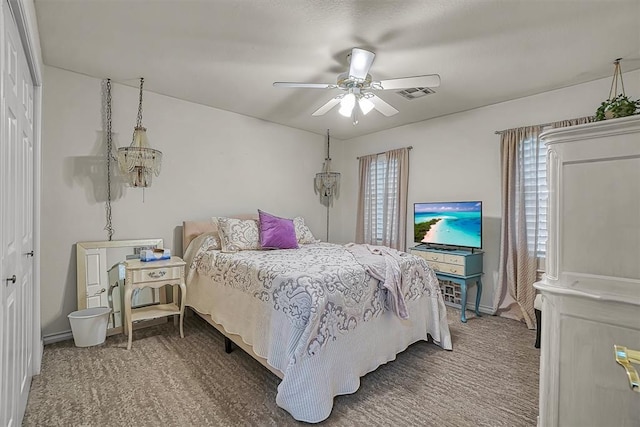 409 Pheasant Cir, Altus, OK 73521 - bedroom featuring carpet floors and ceiling fan