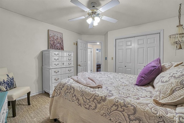 409 Pheasant Cir, Altus, OK 73521 - bedroom with carpet flooring, a closet, and a ceiling fan
