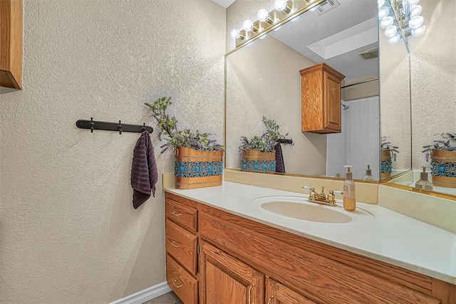 409 Pheasant Cir, Altus, OK 73521 - full bathroom with vanity and a textured wall