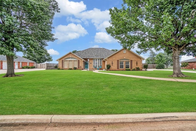 409 Pheasant Cir, Altus, OK 73521 - view of front of home featuring brick siding