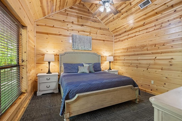 372 Timber Creek Trl, Broken Bow, OK 74728 - bedroom featuring wood walls, lofted ceiling, wood ceiling, carpet floors, and ceiling fan