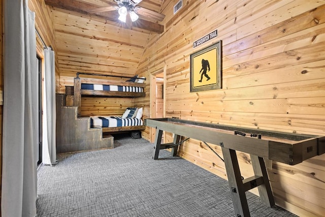 372 Timber Creek Trl, Broken Bow, OK 74728 - unfurnished bedroom featuring carpet flooring, wooden ceiling, wood walls, and vaulted ceiling