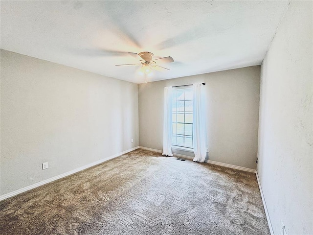 1401 Cedar Ridge Rd, Edmond, OK 73013 - carpeted empty room with ceiling fan and baseboards