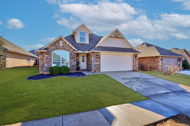 4116 NW 155th St, Edmond, OK 73013 - view of front of house featuring a front lawn, an attached garage, driveway, a shingled roof, and stone siding