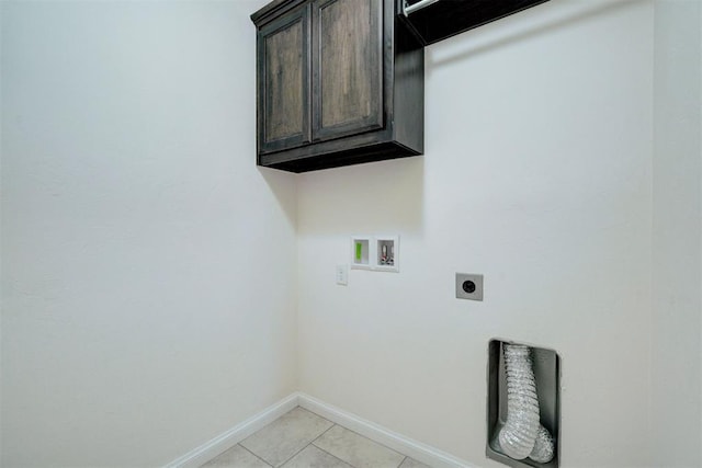4116 NW 155th St, Edmond, OK 73013 - washroom with hookup for an electric dryer, hookup for a washing machine, cabinet space, baseboards, and light tile patterned flooring