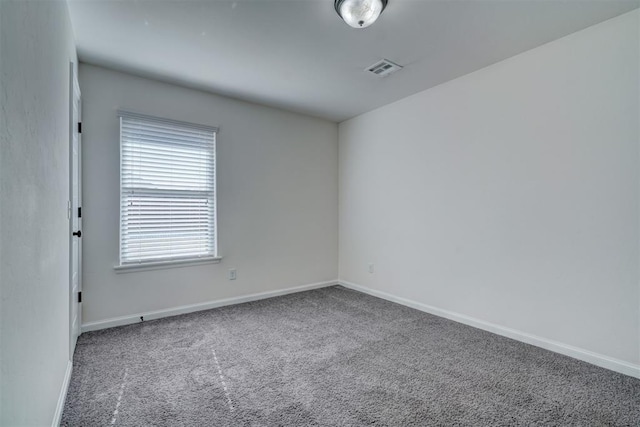 4116 NW 155th St, Edmond, OK 73013 - carpeted spare room featuring baseboards