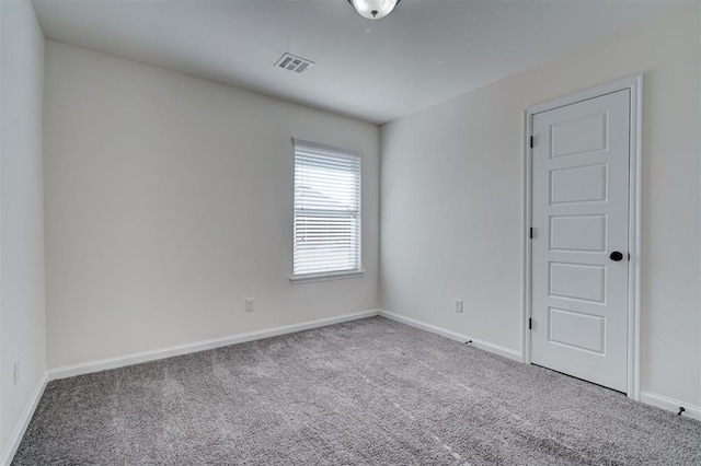 4116 NW 155th St, Edmond, OK 73013 - carpeted spare room featuring baseboards