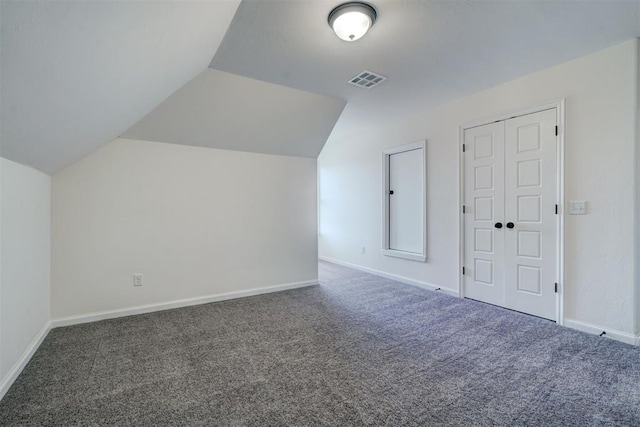 4116 NW 155th St, Edmond, OK 73013 - additional living space with carpet, lofted ceiling, and baseboards