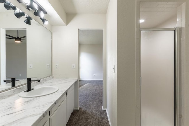 1422 SW 96th St, Oklahoma City, OK 73159 - full bathroom featuring vanity, a stall shower, and a ceiling fan