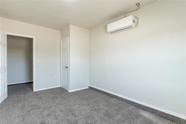 1422 SW 96th St, Oklahoma City, OK 73159 - unfurnished bedroom with a wall unit AC, baseboards, and dark colored carpet