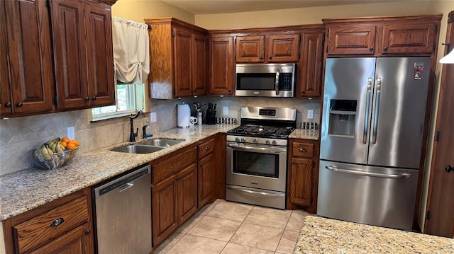 339770 E 1040th Cir, Meeker, OK 74855 - kitchen with stainless steel appliances, a sink, decorative backsplash, and light tile patterned floors