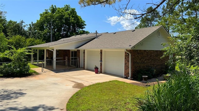 339770 E 1040th Cir, Meeker, OK 74855 - view of front of house with brick siding, an attached garage, concrete driveway, and a front yard