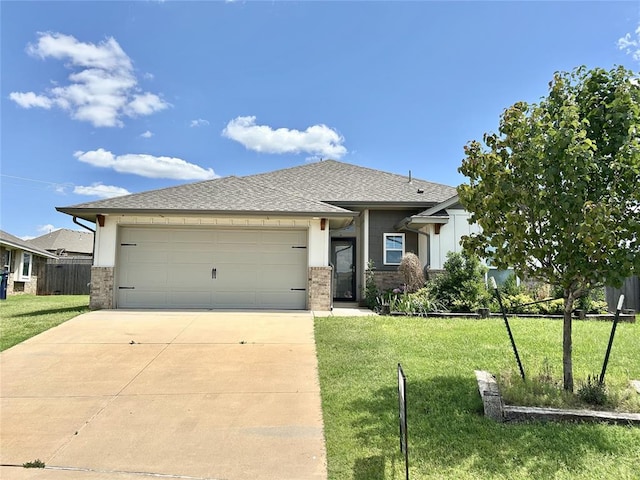 9632 Ashford Dr, Yukon, OK 73099 - view of front of house with a garage, driveway, and brick siding