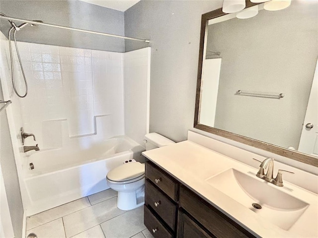 9632 Ashford Dr, Yukon, OK 73099 - bathroom featuring shower / bathtub combination, vanity, and tile patterned flooring