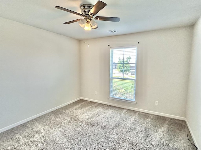 9632 Ashford Dr, Yukon, OK 73099 - empty room with carpet flooring and a ceiling fan