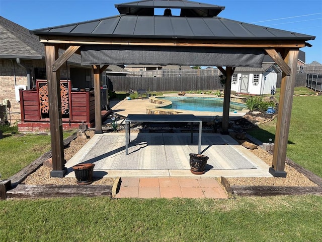 9632 Ashford Dr, Yukon, OK 73099 - fenced backyard featuring a gazebo, a patio, and an outdoor structure