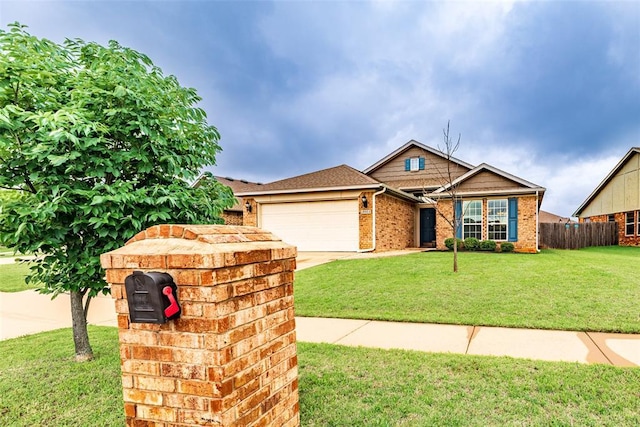19005 Valencia Park Dr, Edmond, OK 73012 - view of front of house with brick siding, a garage, and driveway