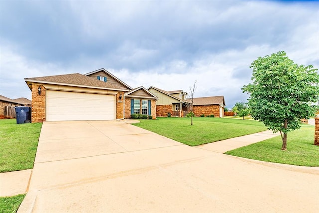 19005 Valencia Park Dr, Edmond, OK 73012 - view of front of house with brick siding, a front yard, driveway, and an attached garage