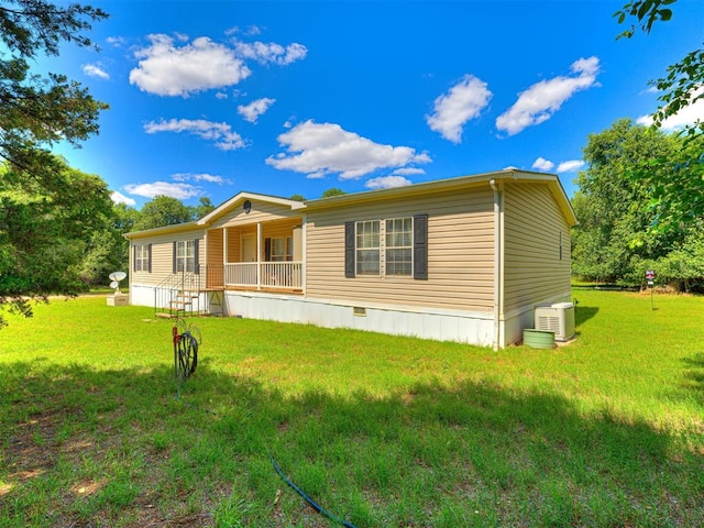 19519 N 2730th Rd, Kingfisher, OK 73750 - manufactured / mobile home featuring covered porch and a front lawn