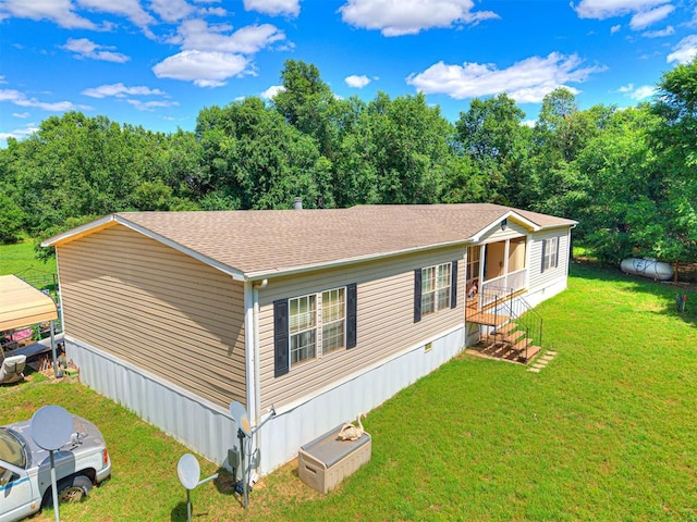 19519 N 2730th Rd, Kingfisher, OK 73750 - view of side of home featuring a lawn and roof with shingles