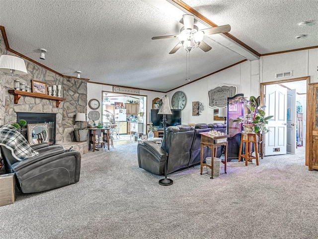 19519 N 2730th Rd, Kingfisher, OK 73750 - living area featuring crown molding, a textured ceiling, carpet flooring, ceiling fan, and a stone fireplace