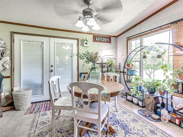 19519 N 2730th Rd, Kingfisher, OK 73750 - dining area featuring ornamental molding, a textured ceiling, ceiling fan, and french doors