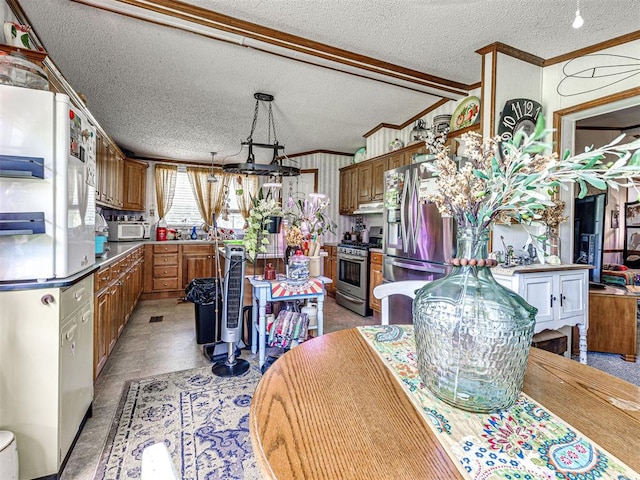 19519 N 2730th Rd, Kingfisher, OK 73750 - kitchen with white appliances, crown molding, a textured ceiling, brown cabinets, and under cabinet range hood