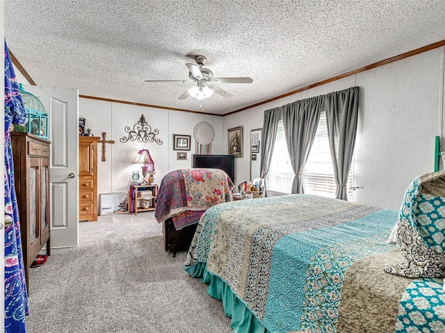 19519 N 2730th Rd, Kingfisher, OK 73750 - bedroom with ornamental molding, a textured ceiling, carpet flooring, and ceiling fan