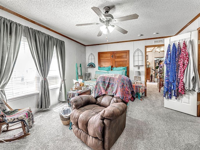 19519 N 2730th Rd, Kingfisher, OK 73750 - carpeted bedroom featuring crown molding, a textured ceiling, and a ceiling fan