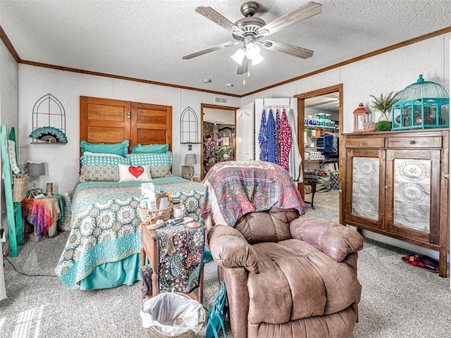 19519 N 2730th Rd, Kingfisher, OK 73750 - bedroom with carpet floors, ornamental molding, a textured ceiling, and ceiling fan